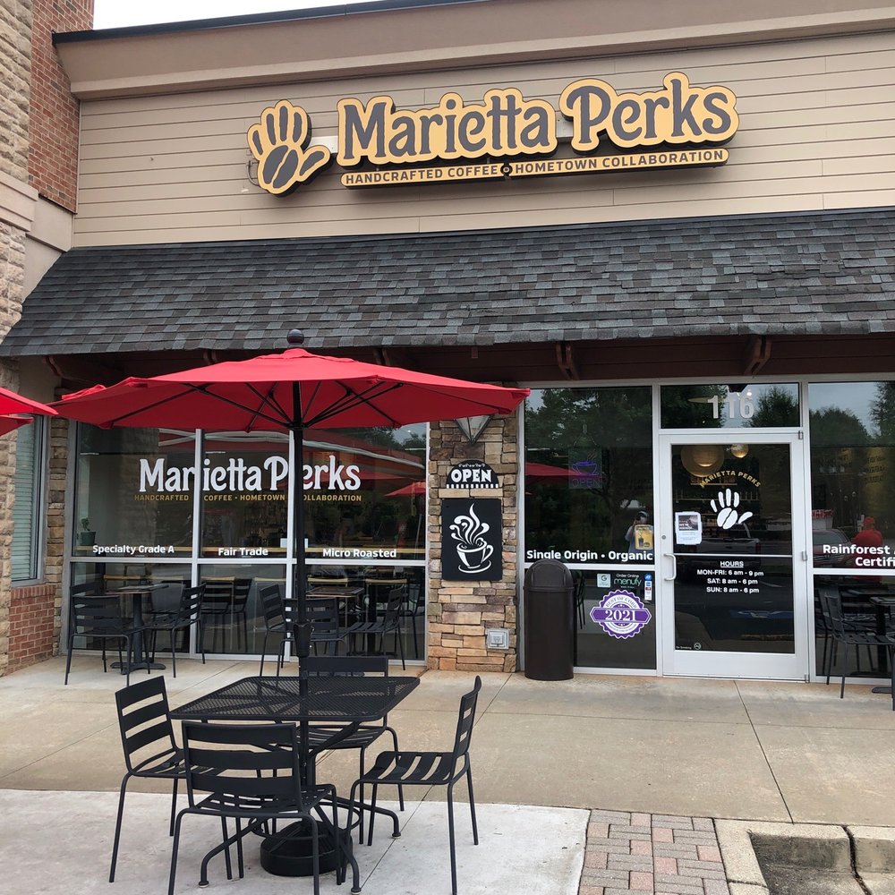 Entrance and outdoor seating Entrance and outdoor seating