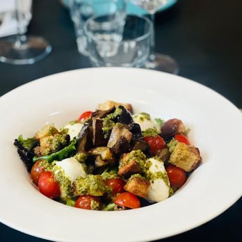 Meridionale - Buffalo Mozzarella salad with eggplant, cherry tomatoes, black olives, basil pesto, and bread croutons - Trattorie Near Me - Rome, RM Meridionale - Buffalo Mozzarella salad with eggplant, cherry tomatoes, black olives, basil pesto, and bread croutons - Trattorie Near Me - Rome, RM