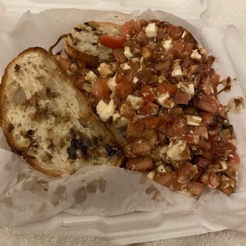 Slices Pizza - Nanny's Bruschetta - Pizza Near Me - Melbourne, Florida
