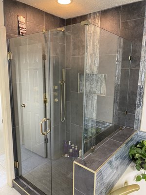 Custom Corner Unit 3/8 glass - I came out and measured this custom shower door enclosure and 2-3 weeks later we installed it in place. This was all done after the tile work was finished. Custom Corner Unit 3/8 glass - I came out and measured this custom shower door enclosure and 2-3 weeks later we installed it in place. This was all done after the tile work was finished.