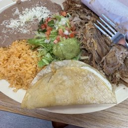 Carnitas plate with beans and rice and quesadillas