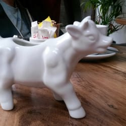 Cafe Fame - The milk is served in a cow jug!