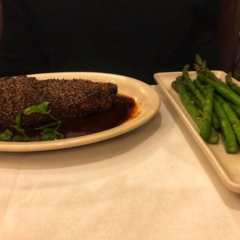 Harry & Izzy's - Pepper Encrusted New York Strip and Asparagus. - Steakhouses Near Me - Indianapolis, Indiana Harry & Izzy's - Pepper Encrusted New York Strip and Asparagus. - Steakhouses Near Me - Indianapolis, Indiana