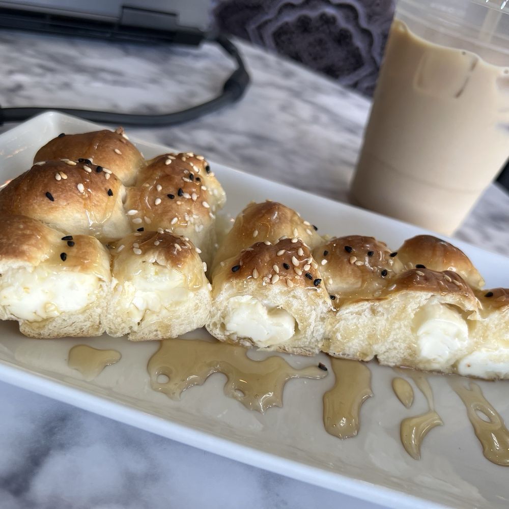 Milyar Coffee - Beehive ( with cream cheese and honey) and a Yemeni latte - Themed Cafes Near Me - Berkeley, California Milyar Coffee - Beehive ( with cream cheese and honey) and a Yemeni latte - Themed Cafes Near Me - Berkeley, California