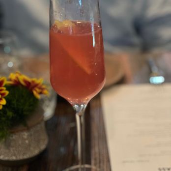 Esther's Kitchen - French 75 cocktail with a splash of chambourd - Italian Near Me - Las Vegas, Nevada