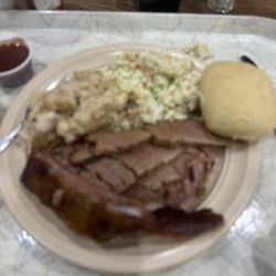 Brisket, coleslaw, potato and roll