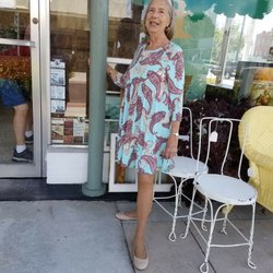 Mother setting up the front of our store for the day.
