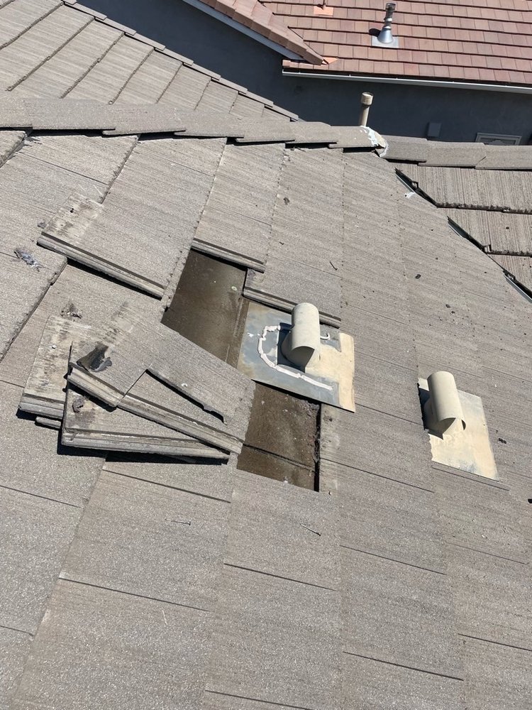 Slide of TMH Roofing