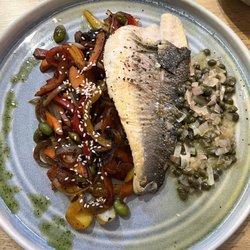 The Red Lion - Pan-fried sea bass with caper sauce and sautéed vegetables.