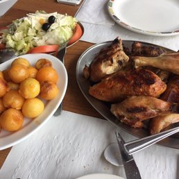 Whole chicken, small potatoes, small salad, 1 Diet Coke, complimentary bread - $20.05 after tax!