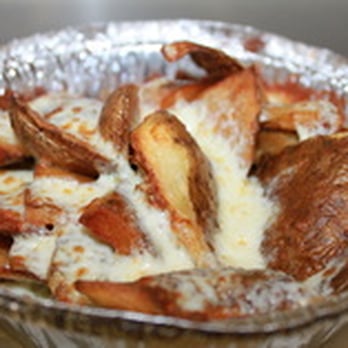 Dimitris Pizza - a bowl of baked french fries - Pizza Near Me - Halifax, Nova Scotia Dimitris Pizza - a bowl of baked french fries - Pizza Near Me - Halifax, Nova Scotia