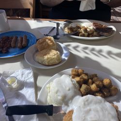 2 eggs & steak-side of bacon & link sausage, biscuit & coffee. Lower: mashed pot., chicken fried steak, white gravy, okra & biscuit