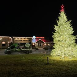 Top of Houston Christmas Light Installations - We have large live Christmas trees available for your yard!