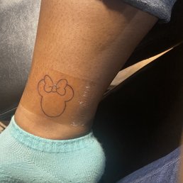 Small Minnie Mouse outlined tattoo Small Minnie Mouse outlined tattoo