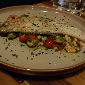 Olea - Branzino with a bed of great cherry tomato and corn - Mediterranean Near Me - Philadelphia, Pennsylvania