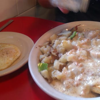 12th Ave. Cafe - Biscuits and Gravy with an over-easy egg on the side - Breakfast & Brunch Near Me - Issaquah, Washington 12th Ave. Cafe - Biscuits and Gravy with an over-easy egg on the side - Breakfast & Brunch Near Me - Issaquah, Washington