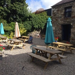 The Blue Bicycle Tea Rooms - Backyard garden with 6 large tables
