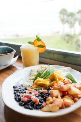 Photo of Wonderland Ocean Pub - San Diego, CA, US. Eggs & Enchiladas during brunch