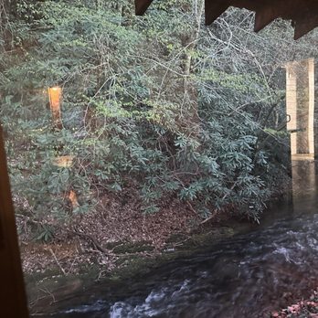 Crystelle Creek - The view behind our table, so beautiful to be by the water! - Steakhouses Near Me - Gatlinburg, Tennessee Crystelle Creek - The view behind our table, so beautiful to be by the water! - Steakhouses Near Me - Gatlinburg, Tennessee