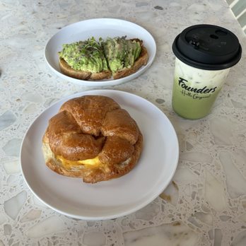 Founders Coffee - St Rose - Iced Banana Matcha with Avocado Toast and Breakfast Croissant Sandwich - Coffee & Tea Near Me - Henderson, Nevada