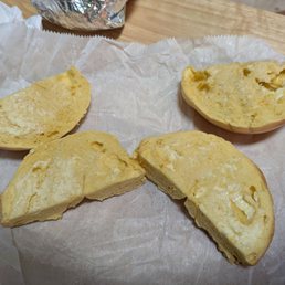 Egg bagel with hardly any butter on it. Egg bagel with hardly any butter on it.