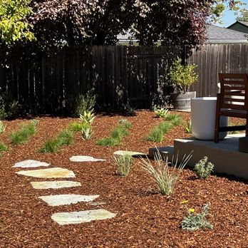 Genesis Landscapes - New plantings and bark. - Landscaping Near Me