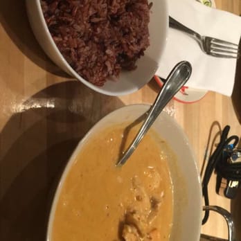Lung Yai Thai Tapas - Massaman curry with chicken and a side of brown rice. - Tapas/Small Plates Near Me - Miami, Florida Lung Yai Thai Tapas - Massaman curry with chicken and a side of brown rice. - Tapas/Small Plates Near Me - Miami, Florida