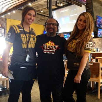Buffalo Wild Wings - Well I just did the fire hot wing challenge in 4.2 minutes . The staff was grate and the food was killer I loved it . - Chicken Wings Near Me - Seaside, California