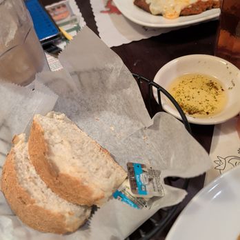 Milano Italian Grille - Bread with spiced oil - Italian Near Me - Ocala, Florida Milano Italian Grille - Bread with spiced oil - Italian Near Me - Ocala, Florida