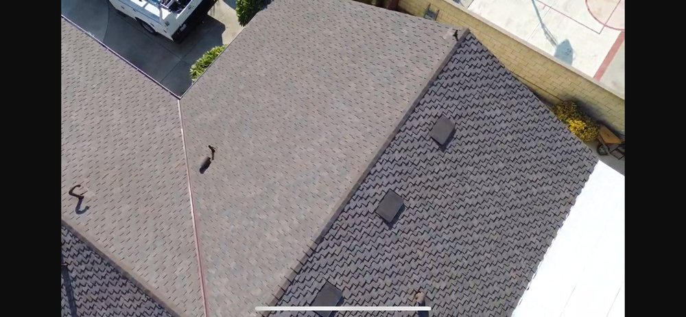 Slide of MC Elite Roofing