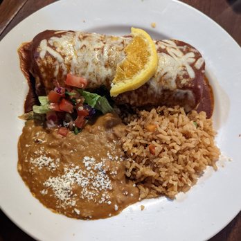 El Charro Cafe - Carnitas Burrito for $14.95 + $1.25 up-charge for Chimichanga style + $2.95 up-charge for Enchilada style. - Tacos Near Me - Tucson, Arizona