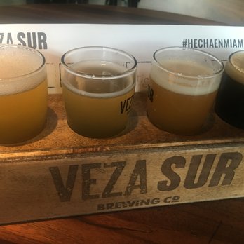 Casa La Rubia - Mango Blonde Ale, Guava Sour, Trigo IPA, and Per'la Coffee Porter Tasting Flight - Breweries Near Me - Miami, Florida