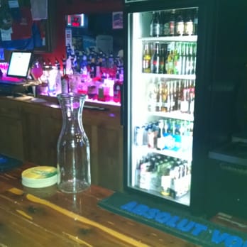 Bohemian Hill Tavern - a bar with a beer fridge - Bars Near Me - Rosenberg, Texas