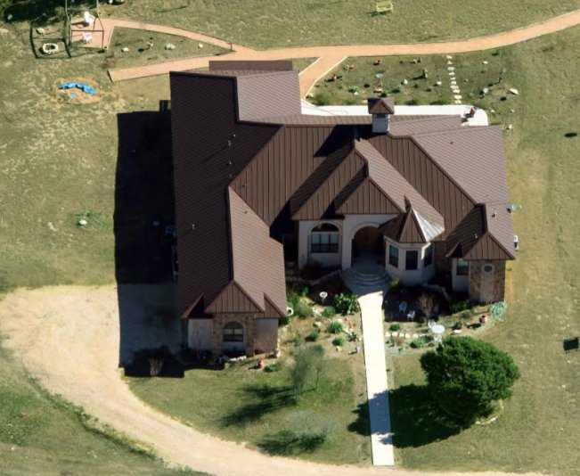 Slide of Green Knight Metal Roofing