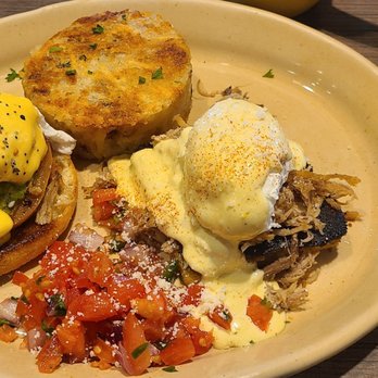 Snooze, an A.M. Eatery - Half and half of Chile Verde and Smashed Avocado Eggs Benedict - Breakfast & Brunch Near Me - Phoenix, Arizona