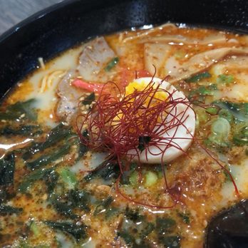 Raijin Ramen - Spicy tonkatsu ramen with karaage and takoyaki in the background - Ramen Near Me - Tucson, Arizona Raijin Ramen - Spicy tonkatsu ramen with karaage and takoyaki in the background - Ramen Near Me - Tucson, Arizona