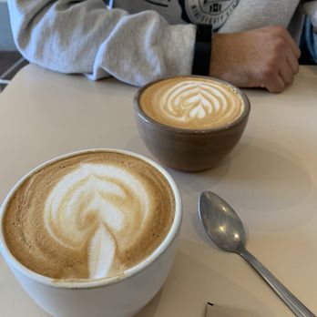 Neat Coffee - Cappuccino and almond milk latte (with nice latte art--minus mine bc I sipped on it) - Coffee & Tea Near Me - Costa Mesa, California Neat Coffee - Cappuccino and almond milk latte (with nice latte art--minus mine bc I sipped on it) - Coffee & Tea Near Me - Costa Mesa, California
