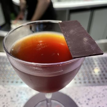 Super Lyan - The Paradiso Manhattan Cocktail with mushroom powder chocolate bar(16 Euros) - Cocktail Bars Near Me - Amsterdam, New Hampshire Super Lyan - The Paradiso Manhattan Cocktail with mushroom powder chocolate bar(16 Euros) - Cocktail Bars Near Me - Amsterdam, New Hampshire
