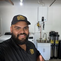 Everyday Water Heaters - Garage transformation in Solana Beach! Relocated tankless water heater, a brand-new salt softener, whole-house purification, and a sink!