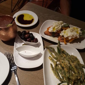 Pasta Moon - Moscow Mule, house olives, tomato and basil bruschetta & tempura battered green bean appetizer. - Italian Near Me - Half Moon Bay, California Pasta Moon - Moscow Mule, house olives, tomato and basil bruschetta & tempura battered green bean appetizer. - Italian Near Me - Half Moon Bay, California
