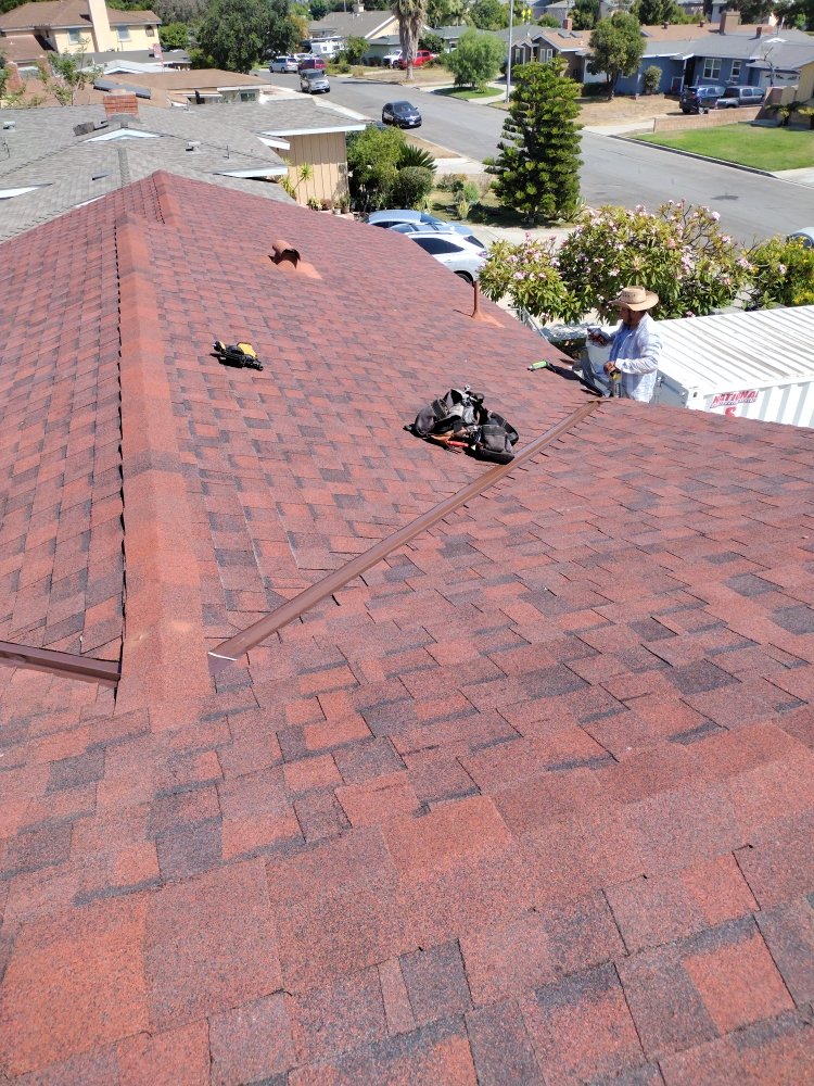 Slide of J&C López Roofing