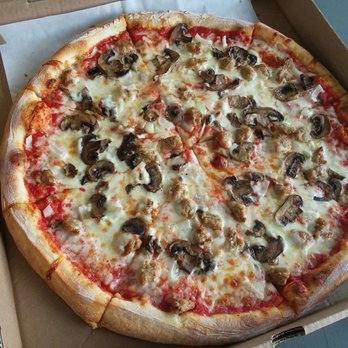 Giuseppe's - Pie with sausage, mushrooms and onions - Pizza Near Me - Lake George, New York Giuseppe's - Pie with sausage, mushrooms and onions - Pizza Near Me - Lake George, New York