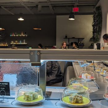Umai Revolving Sushi - a display of sushi - Sushi Bars Near Me - Rochester, New York Umai Revolving Sushi - a display of sushi - Sushi Bars Near Me - Rochester, New York