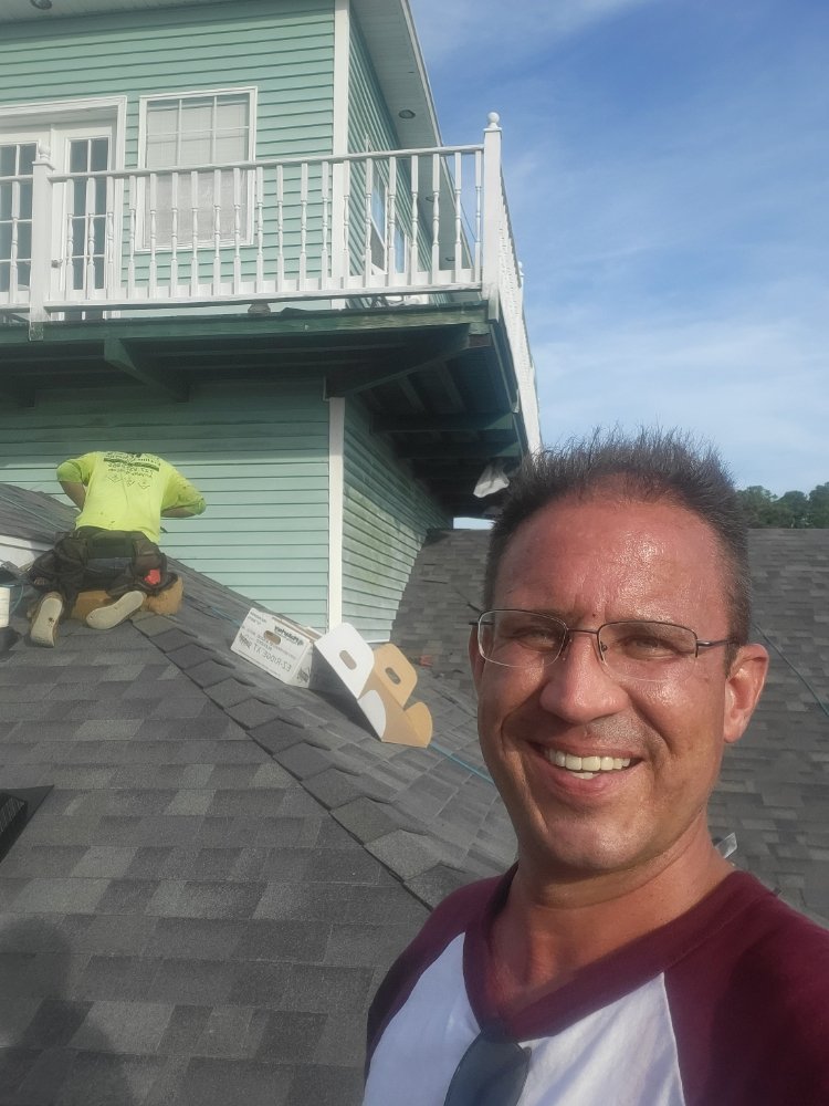 Slide of Anything & Everything Roofing