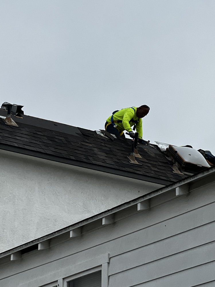 Slide of Araujo Roofing