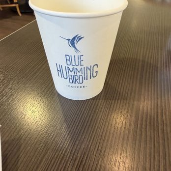 Blue Hummingbird Coffee and Kitchen - Water cup with Blue Hummingbird Coffee branding. - Coffee Roasteries Near Me - Irvine, California Blue Hummingbird Coffee and Kitchen - Water cup with Blue Hummingbird Coffee branding. - Coffee Roasteries Near Me - Irvine, California