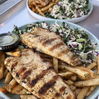 California Fish Grill - Sea bass and catfish plates. Kale slaw and fries as sides. - Seafood Near Me - San Diego, California
