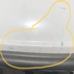 Roberto's Boat Repair - More paint overspray from attempting to paint over their scratches