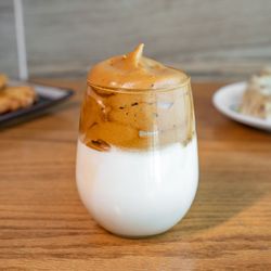 Dalgona coffee is a whipped, frothy iced coffee drink made with instant coffee,