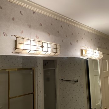 JK Custom Painting - Bathroom before with wallpaper - Painters Near Me - Creedmoor, North Carolina